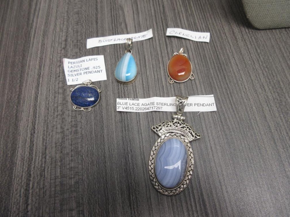 Four Pendants in 925 Sterling Silver Various Stones