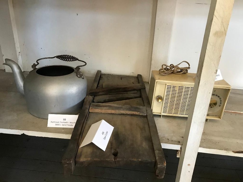 Antique cabbage shredder, aluminum tea kettle & General Electric radio