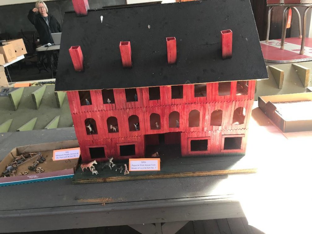 Popsicle stick house from model of Lock & Dam No. 7 w/ model figurines
