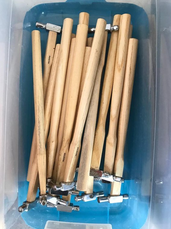 Box of several small tack hammers