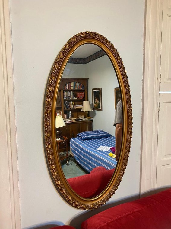 Round plastic frame mirror 34" x 19"