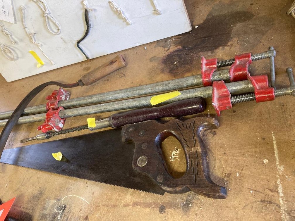 Lot tools: hand saw, pipe clamps, etc