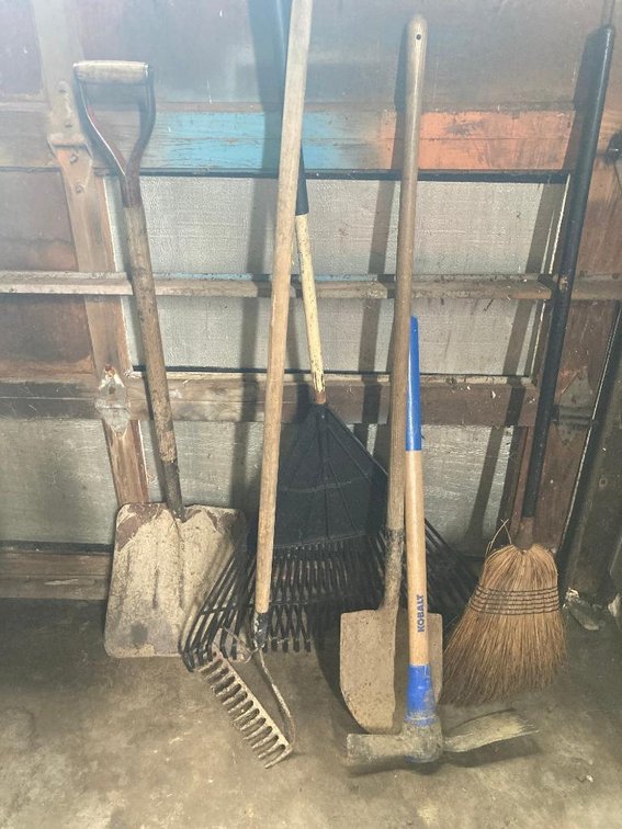 Lot yard tools: rake, shovel, pick, etc