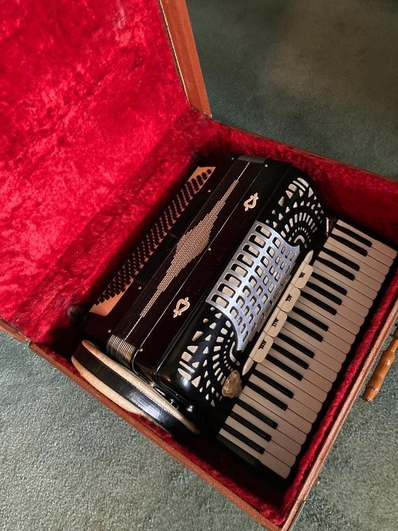 Imperial accordion in case, plays