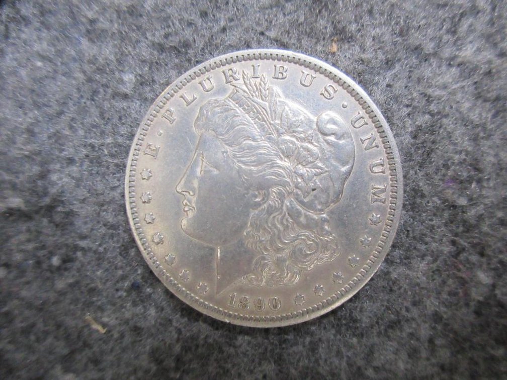 1890-O Morgan Dollar AU with reserve