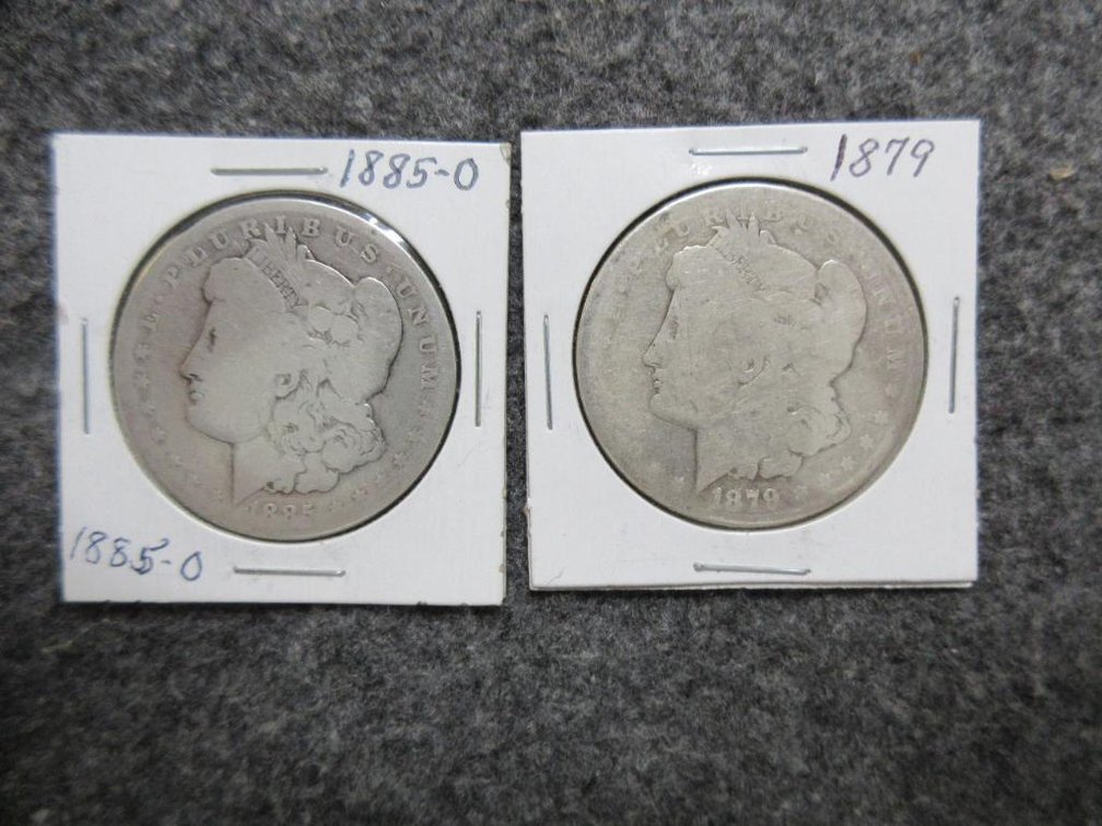 2 1879 & 1885-O Morgan silver dollars, worn