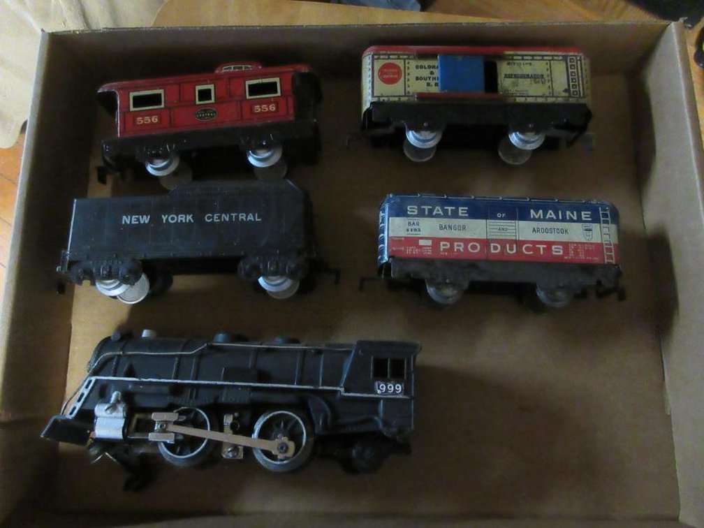Marx Triple 9 engine, New York Central Tender, Colorado & Southern Railroad refrigerated box car #817, State of Maine Products box car #BAR4495, New York Central caboose 556