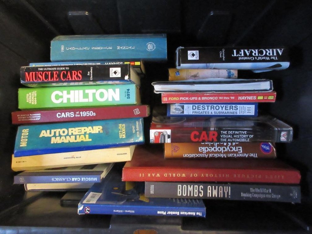 Tote w/ 1980 Cadillac service manuals, muscle car books, Ford pickups & Broncos books, The World's Greatest Aircraft, Bombs Away, Encyclopedias of Medicine & other books