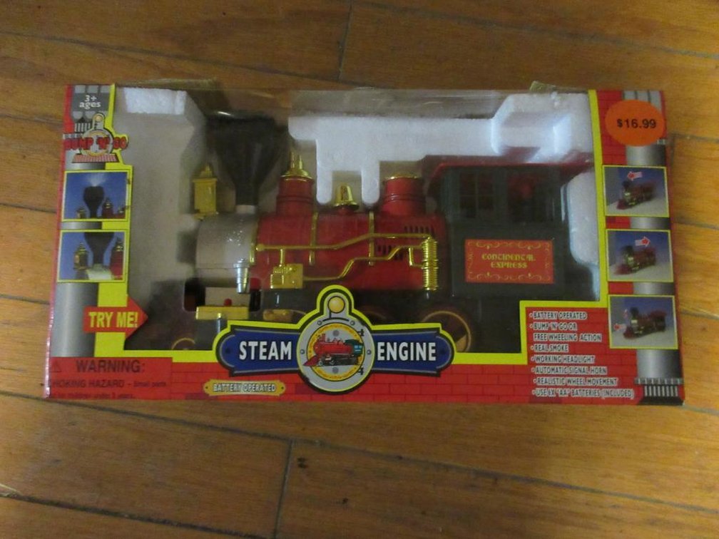 Battery-operated steam engine in box