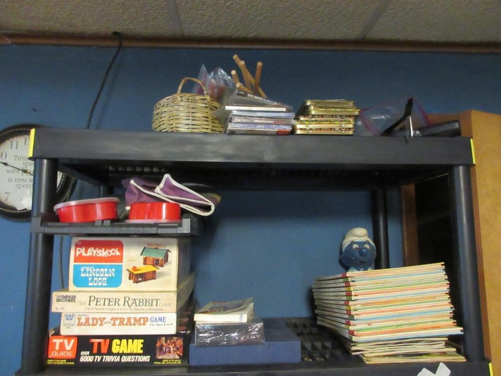 1 Lot of children's books - Sesame Street Volume 1-14, Playskool Lincoln Logs, board games, toy crossbow, etc.; shelf is NOT included