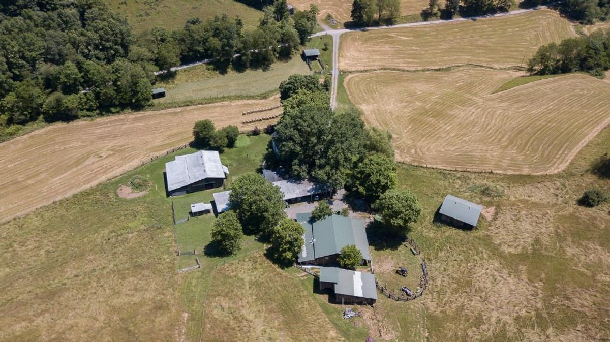 Subject #1: 52.12 +/- Acres with Farmhouse & Buildings