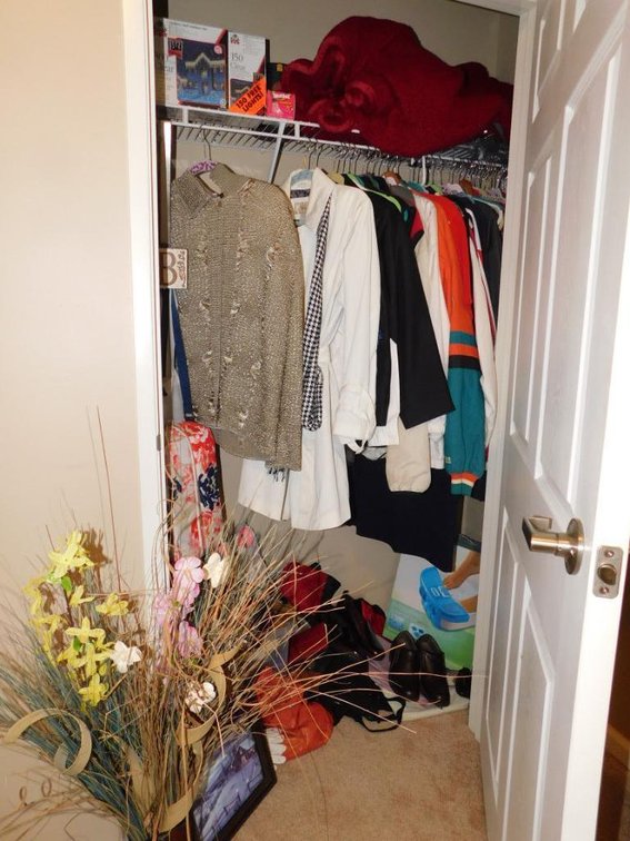 Contents of closet - ladies clothing to include coats, jackets, shoes, gloves, shoes, Home Medics foot spa, suitcases, hats & gloves