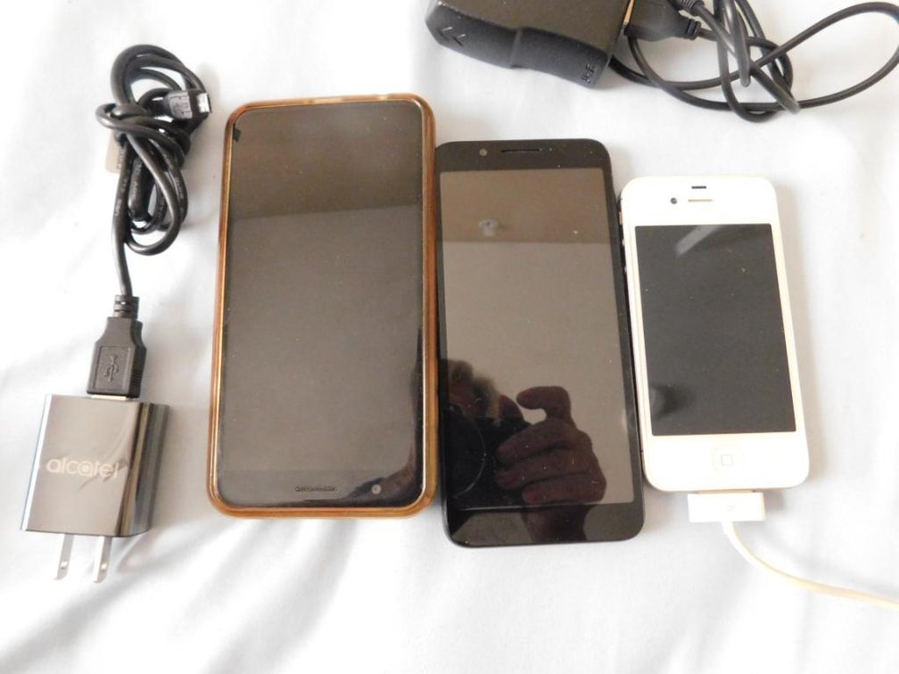 3 Cell phones; one is LG, one is an Apple & other not sure