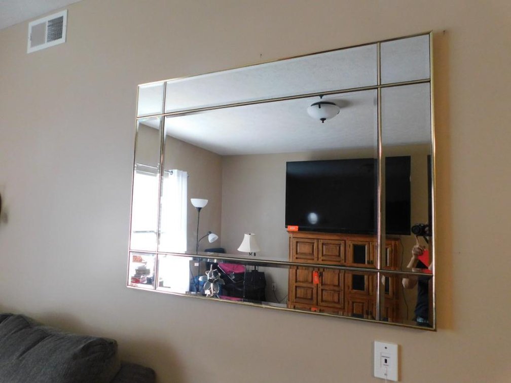 Beveled edge mirror w/ brass trim