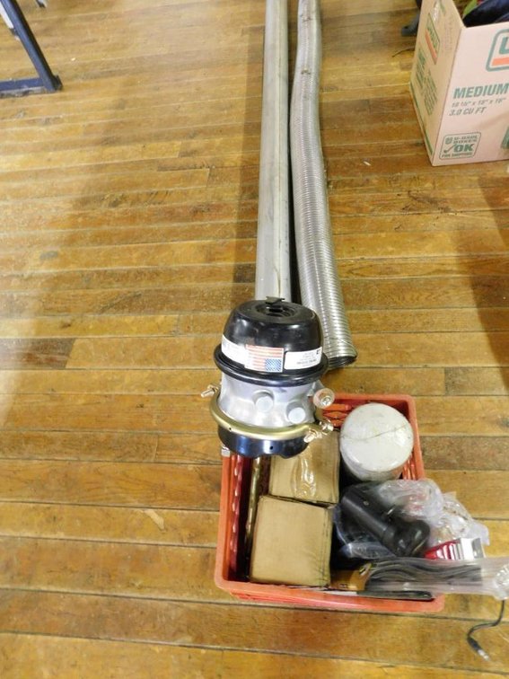 Lot of tractor trailer & large truck supplies including brake cylinder, oil filters, shift knob & exhaust pipes