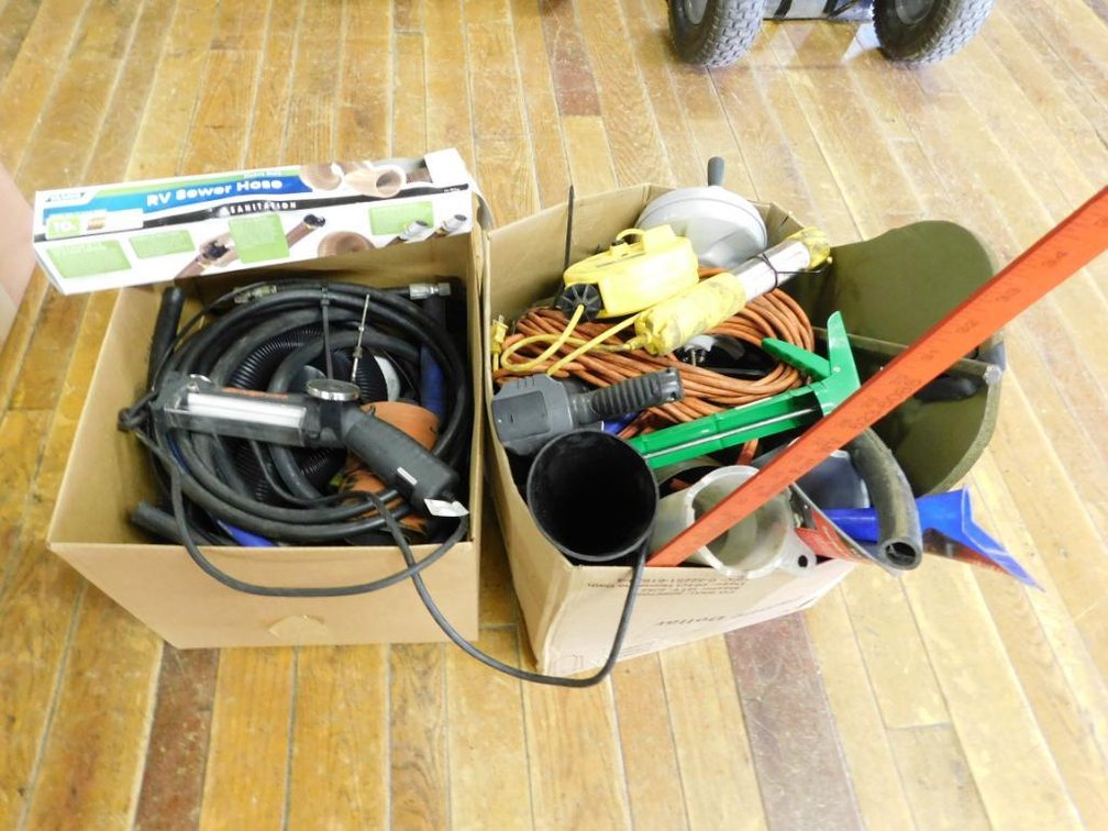 2 Lots of fluid cones, electrical cords, Ridgid drain snake, shop lights, hose, etc.