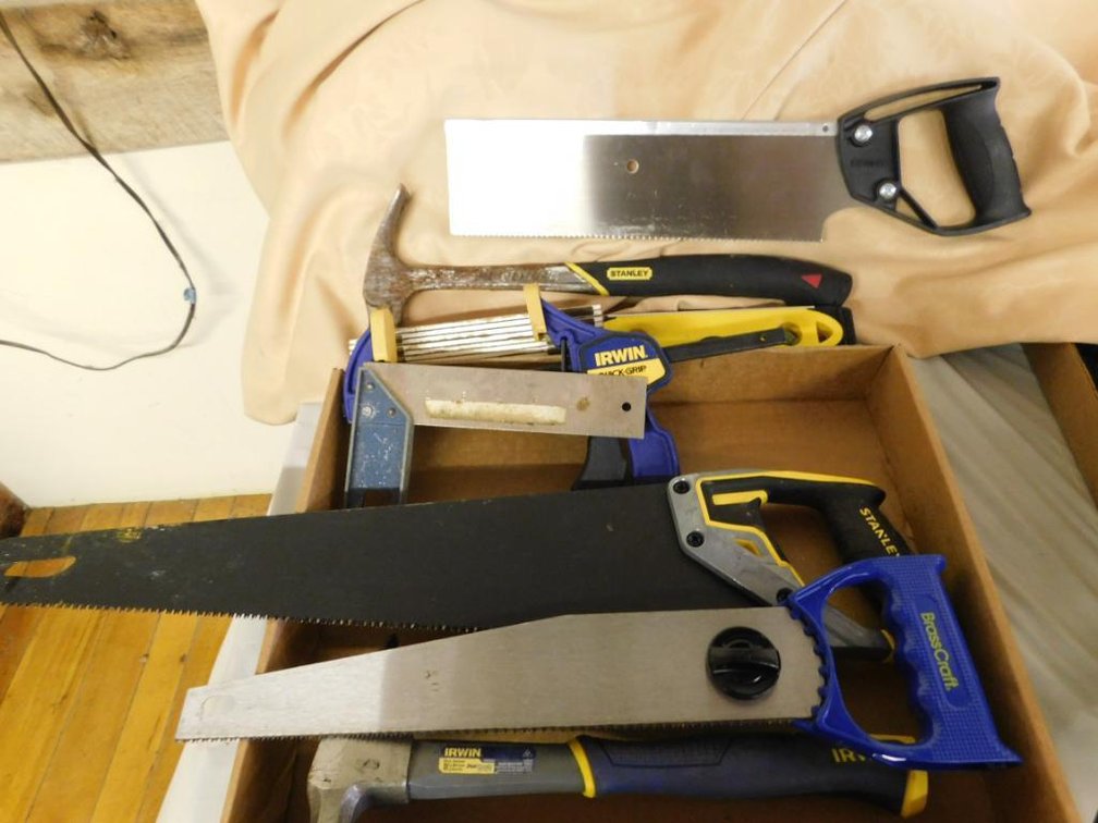 Lot of Stanley & Irwin hand tools including hand saws, hammers, level, C-clamp