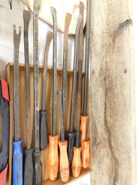 Assortment of handled pry bars, some Snap-On