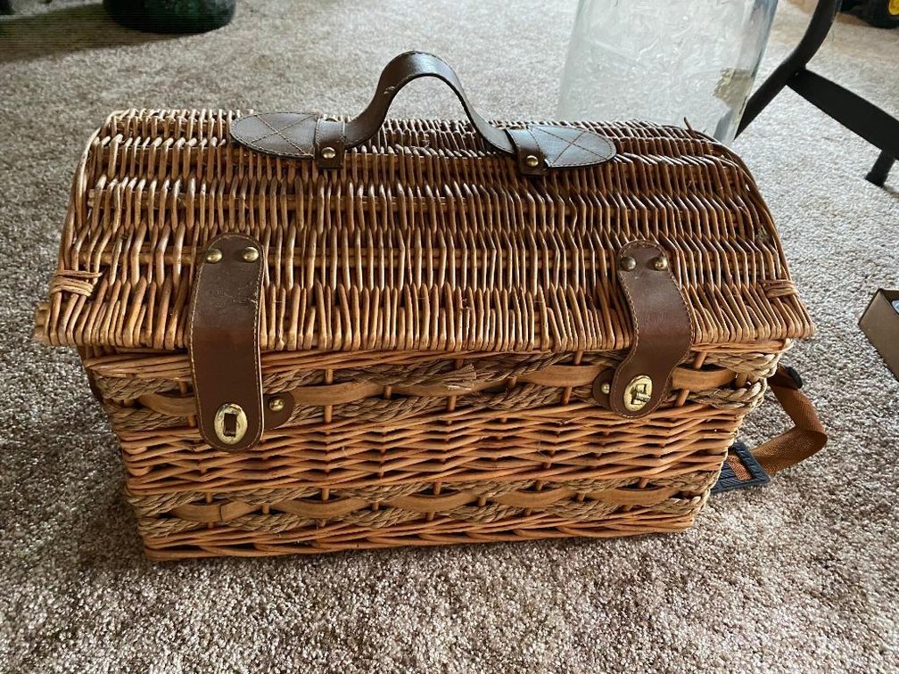 Wicker picnic basket and contents