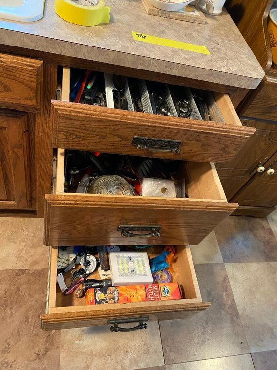 Contents 3 drawers: flatware, metal utensils, etc