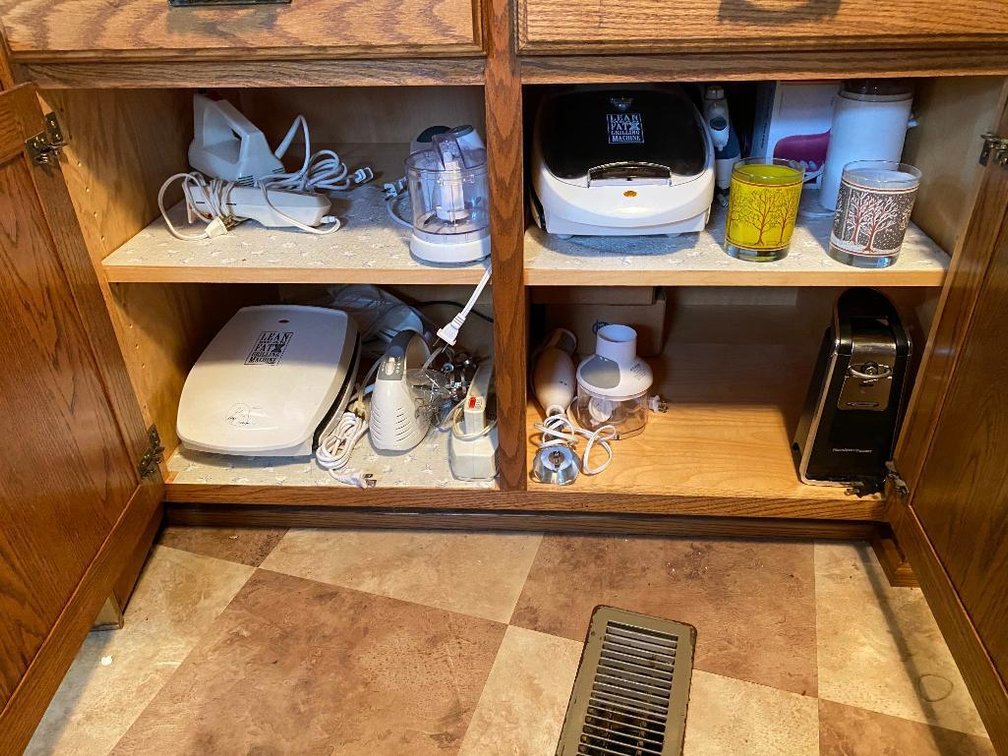 Contents bottom cabinet: appliances: mixers, George Forman grill, chopper, etc