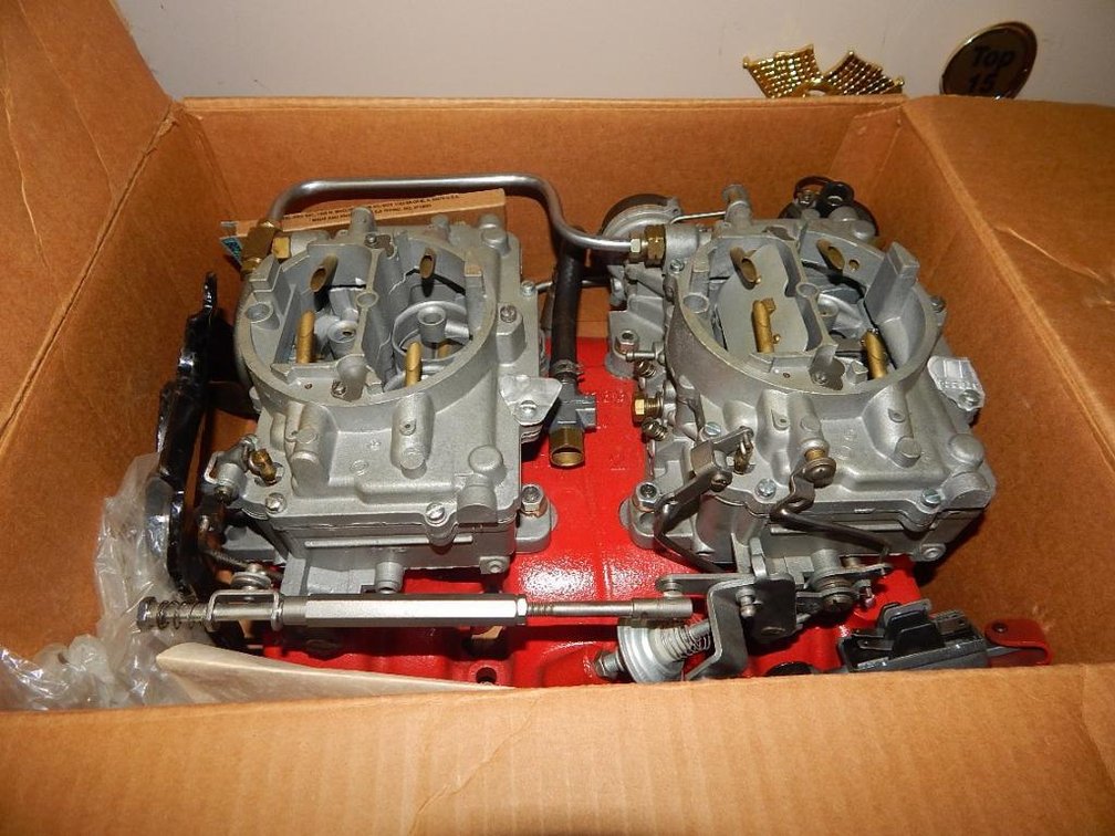 66 Riviera intake manifold w/ two -4 barrel carburetors (new in box)