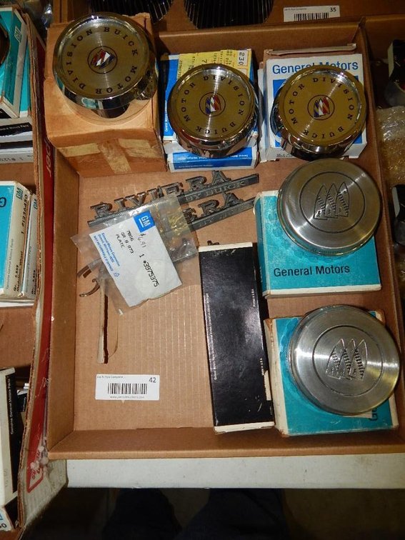 Flat of Buick hub cap centers & Riviera emblem