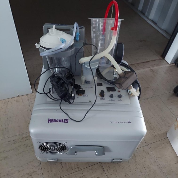 Hercules by Wells Johnson suction unit w/accessories