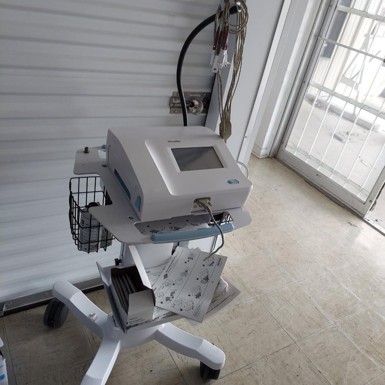 Well Allyn model #CP150 EKG w/ cart & accessories