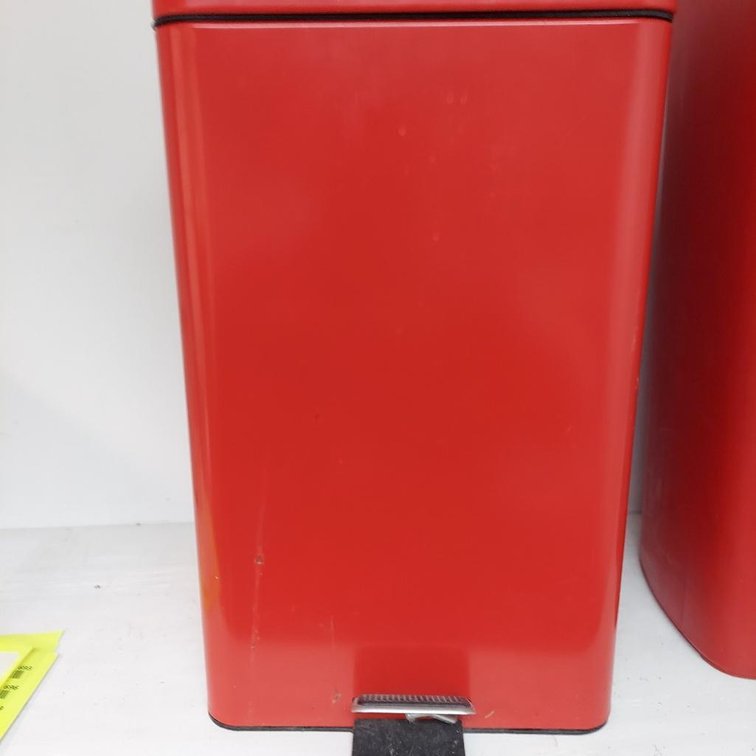 Red metal trash can