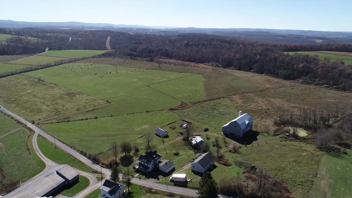 Image for SOLD $632,500 - 91-Acre Farm with 6-Bedroom Home Being Sold to the Highest Bidder