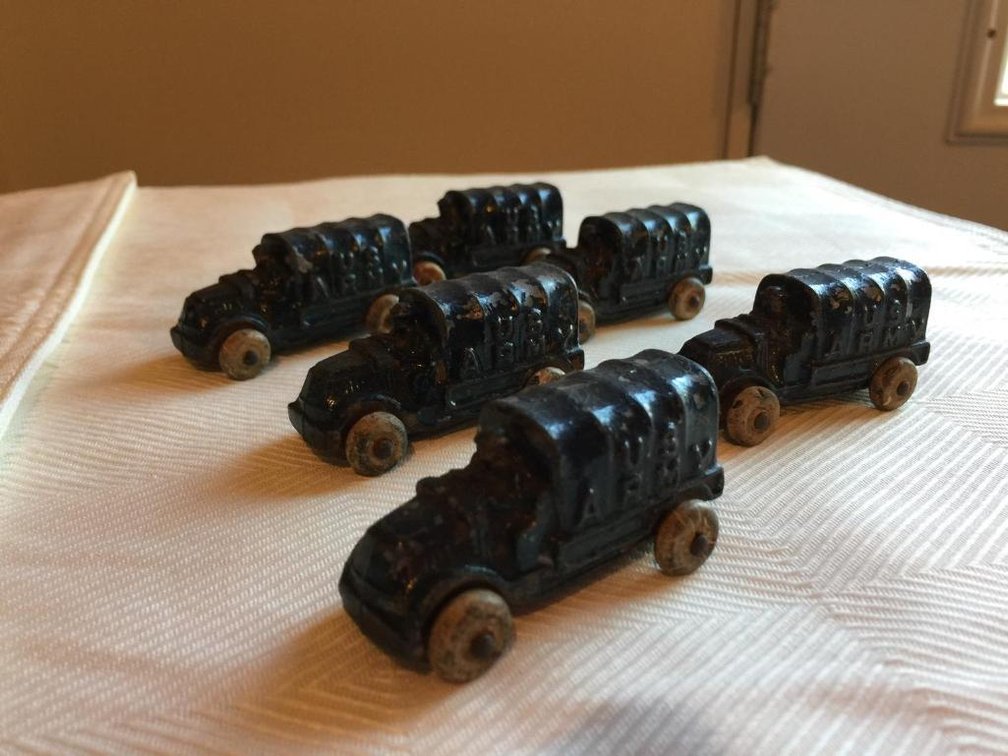 Six Barclay slush metal Army trucks rubber wheels