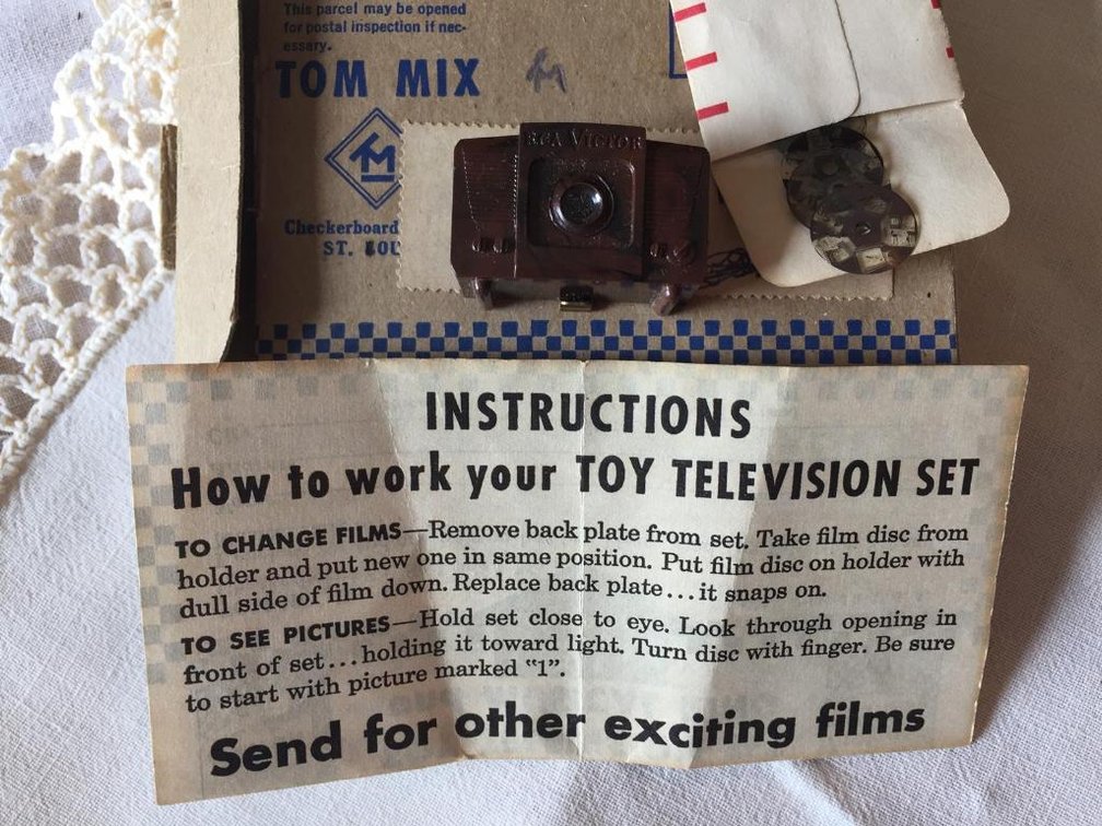 1949 Rare TOM MIX bakelite mini television and extra picture disks in original box with instructions
