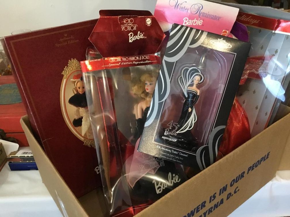 Modern Barbie dolls in boxes and Hallmark 45th Anniversary Barbie ornament