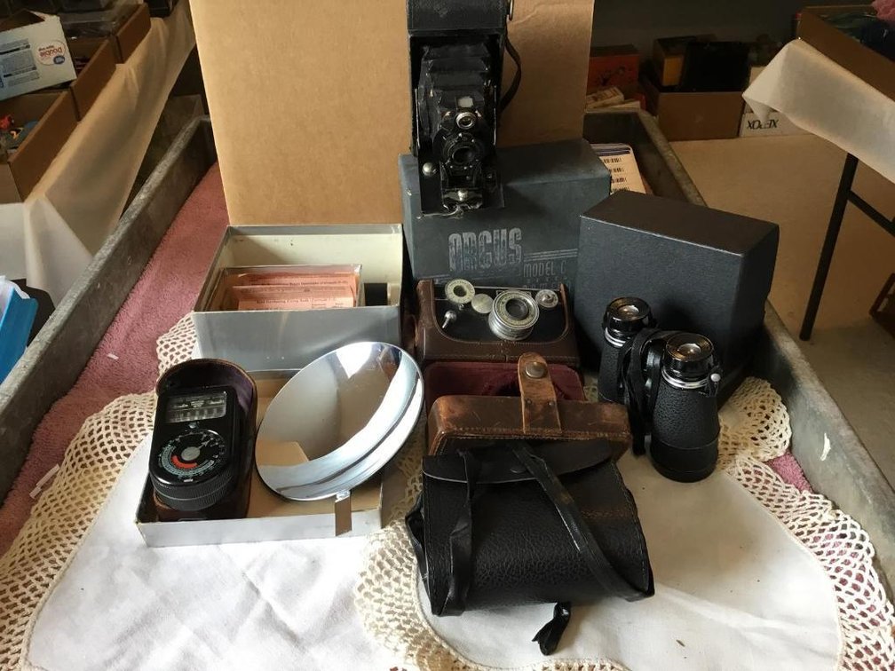 Vintage Argus camera and flash kit, light meter, and binoculars
