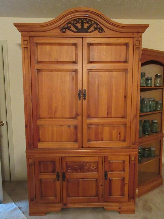 Broyhill entertainment center; contents not included