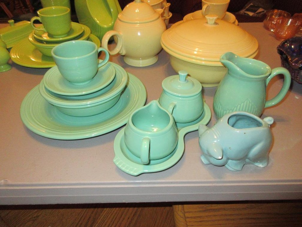 Teal Fiestaware w/ creamer & sugar set & cup, plate & bowl