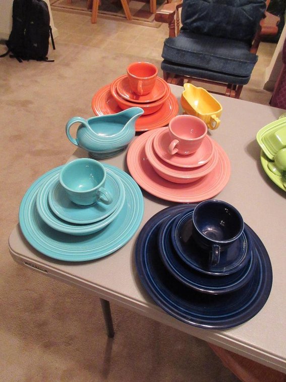 Multicolored Fiestaware w/ 3 cups, 2 gravy boats, plates & bowls