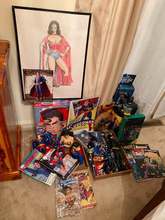 Large collection of Superman and Batman memorabilia