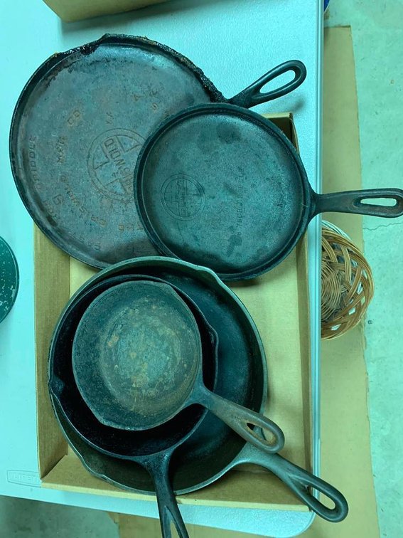 Cast iron skillets & griddles; griddles are Griswold