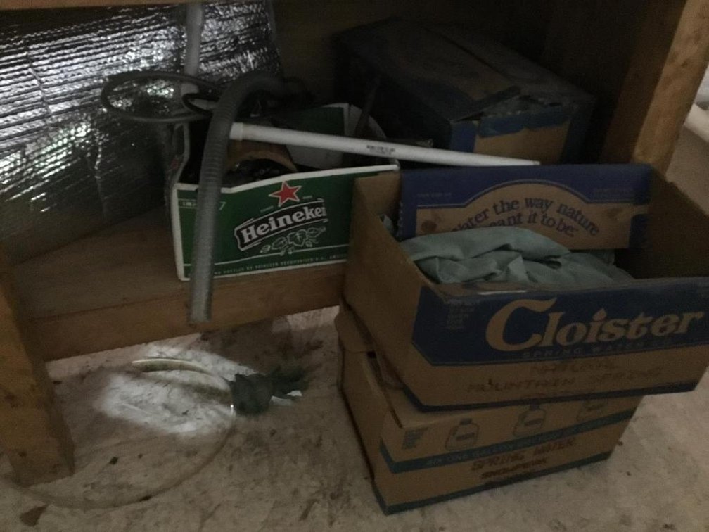Contents under table: welding jackets, PVC pipe, etc.