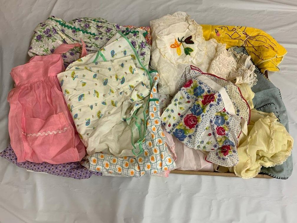 Collection of vintage aprons and child aprons
