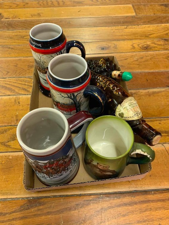 Budweiser holiday steins & whiskey bottles