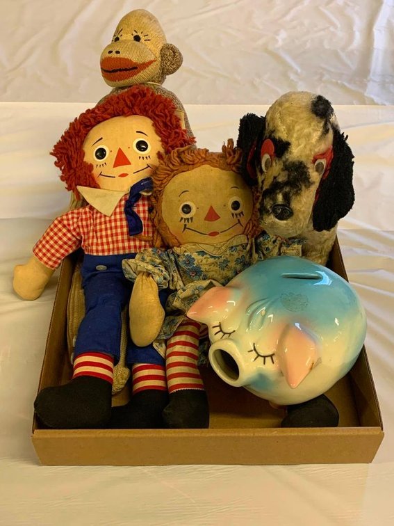 Vintage children's toys; Raggedy Ann dolls, sock monkey & Porky Pig piggy bank