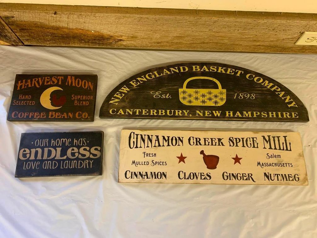 Collection of wooden hand-painted decorative signs