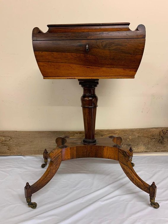 Antique tea holder w/ casters & w/ key