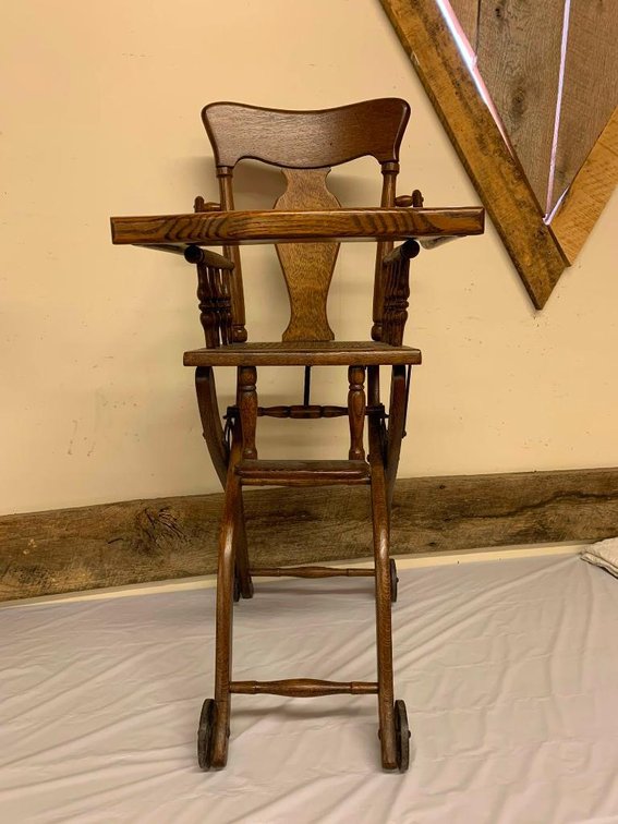 Antique high chair w/ cane bottom seat & wheels
