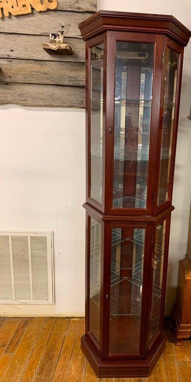 Octagonal lighted curio cabinet