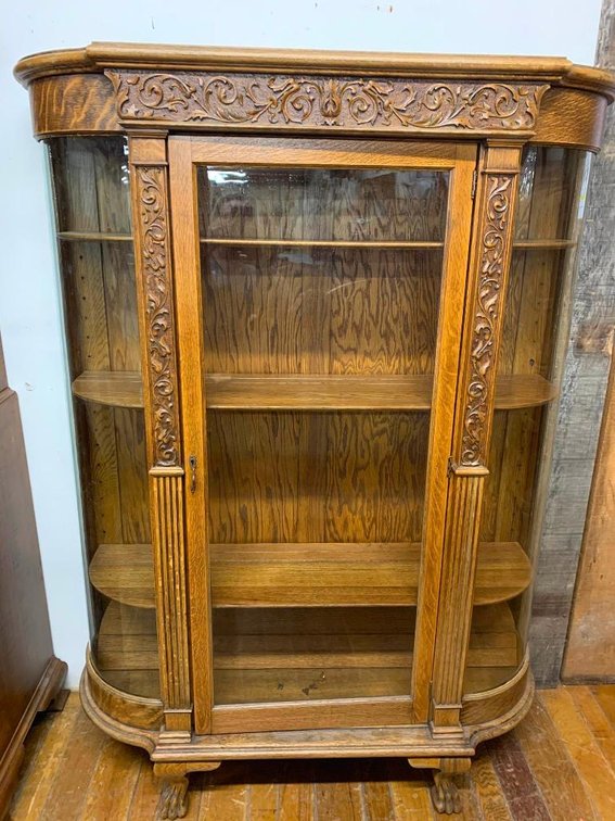 Antique curved glass oak cabinet w/ claw feet (no key)