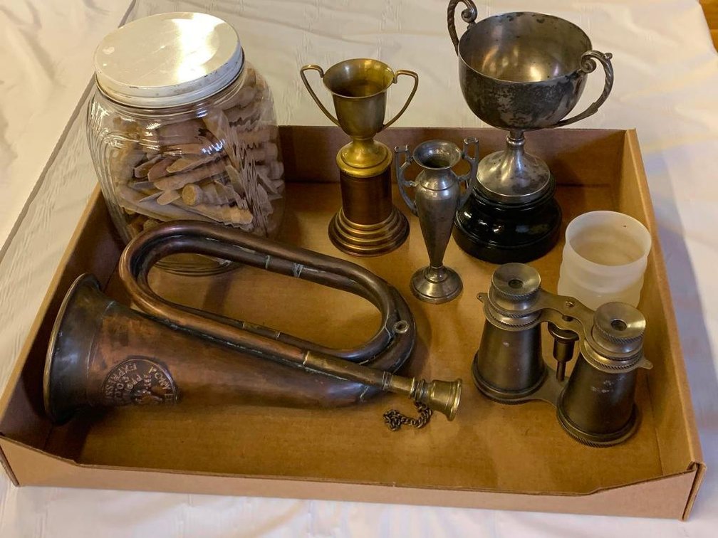 Decorative items, trophies, Pony Express horn, binoculars, wooden clothes pins
